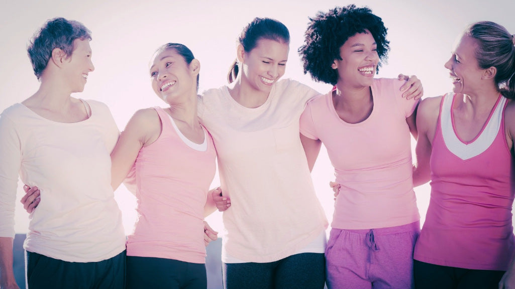 image showing a group of smiling women in sportswear